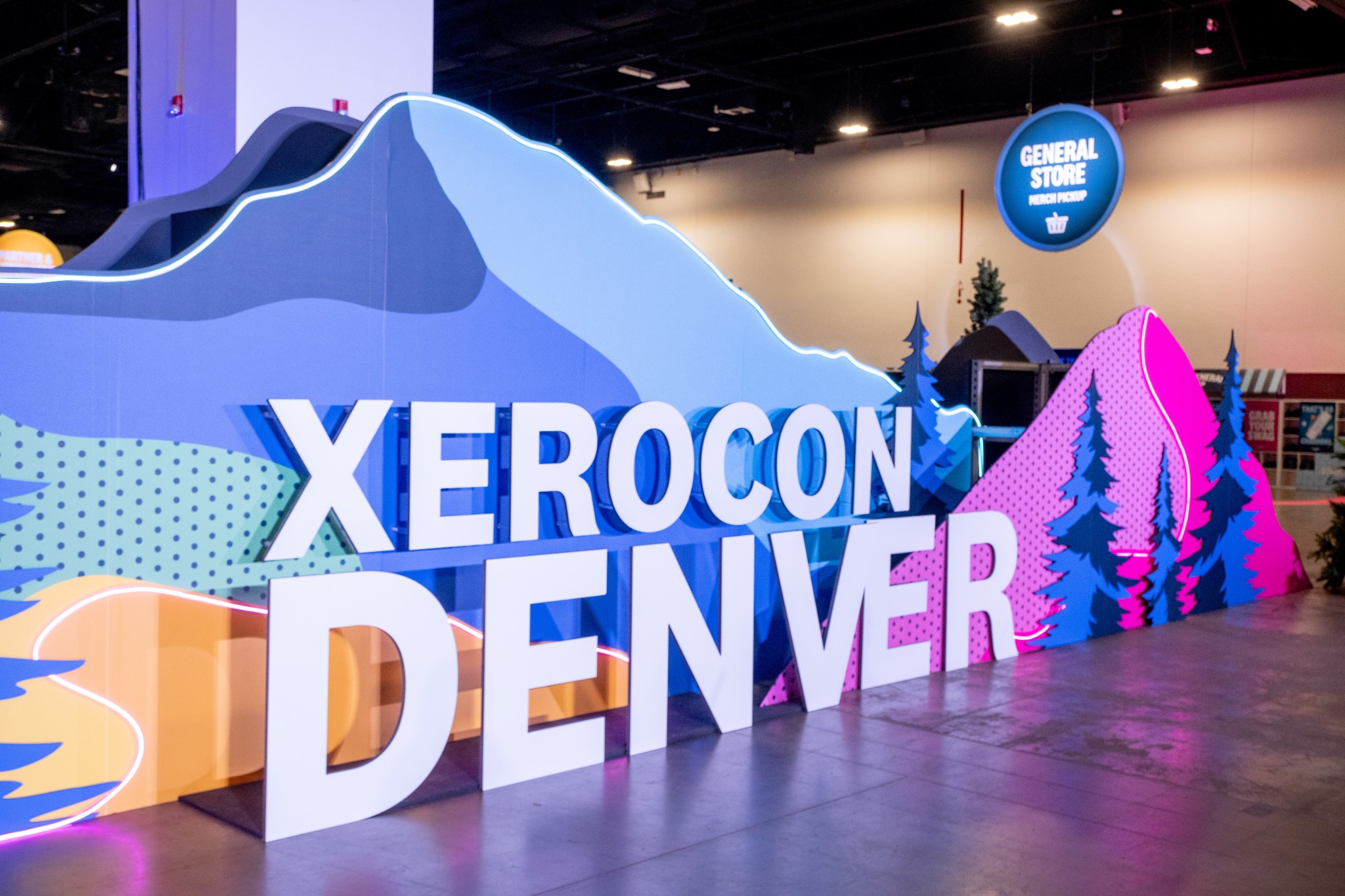 Illuminated Xerocon Denver sign in the event expo