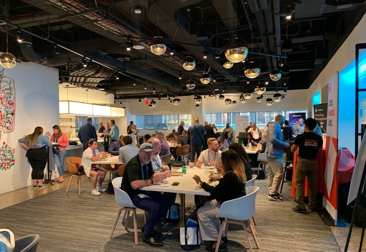 Roadshow attendees networking over lunch